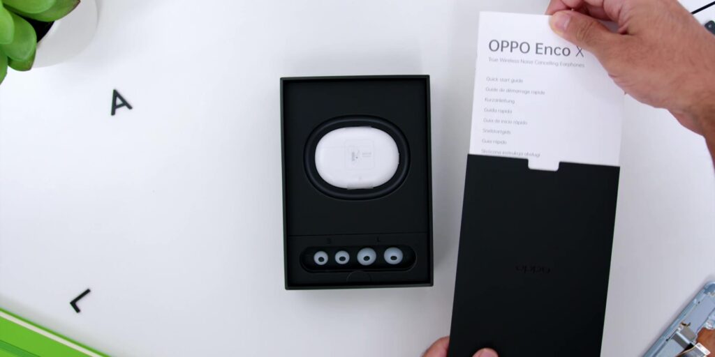 1.4 case and manuals 1080p Oppo Enco X.mp400008