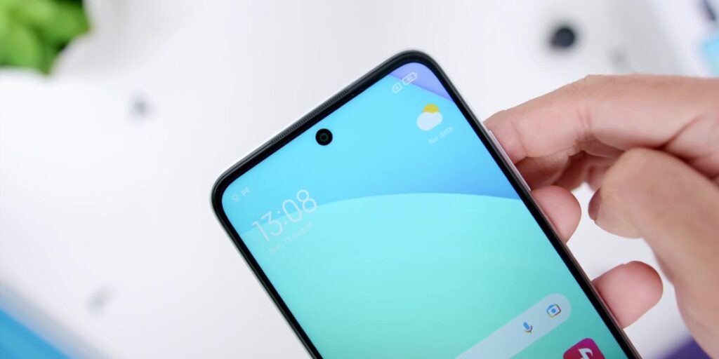3.4 cam hole punch 1080p Redmi 10 Full Review.mp400007