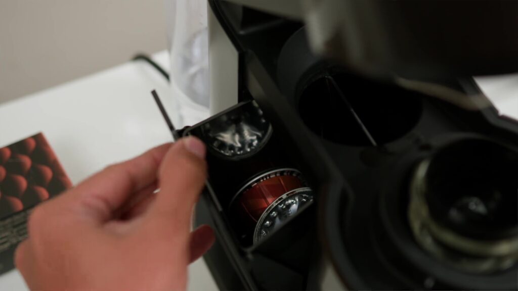 Coffeeholic Approved! Why the Nespresso Vertuo Next is a Must-Have for Coffee Enthusiasts ☕ 21 4.11 side machine capsule