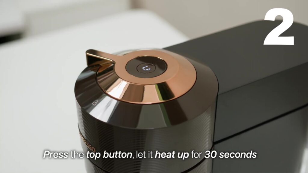 Coffeeholic Approved! Why the Nespresso Vertuo Next is a Must-Have for Coffee Enthusiasts ☕ 15 4.5 step 2 press button