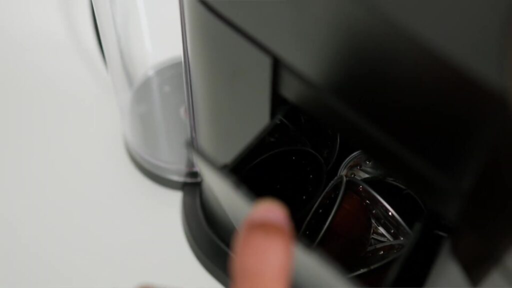 Coffeeholic Approved! Why the Nespresso Vertuo Next is a Must-Have for Coffee Enthusiasts ☕ 6 2.3 side compartment