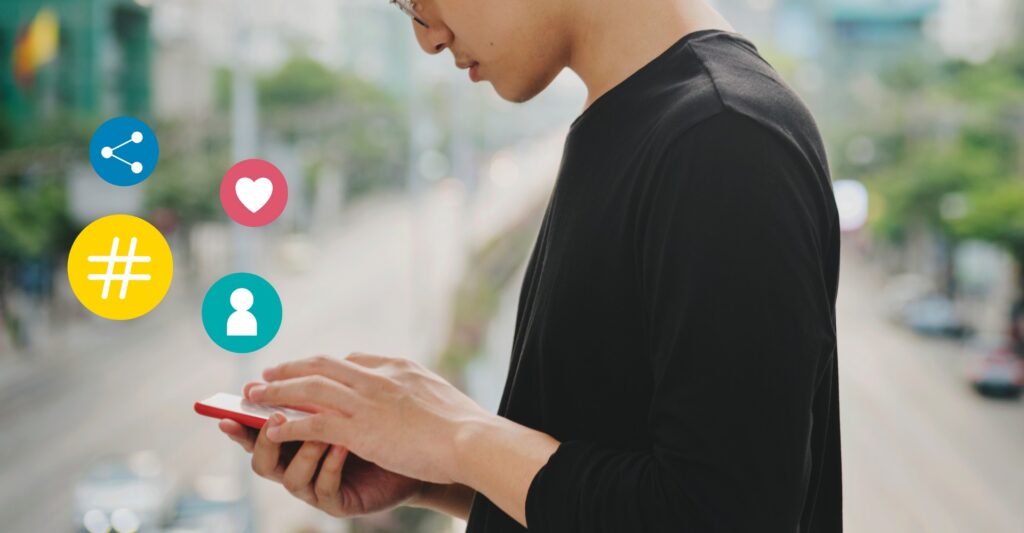 The End of “Free Social Media”: Why Meta’s Ad-Free Subscription Is a Terrible Idea 4 Man Using Phone