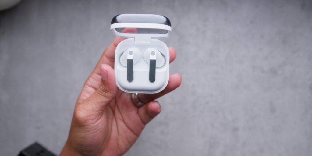 Samsung Galaxy Buds4 Pro Review: The Best Earbuds of 2026? 3 Top down view of the Galaxy Buds4 Pro earbuds resting inside their charging case.
