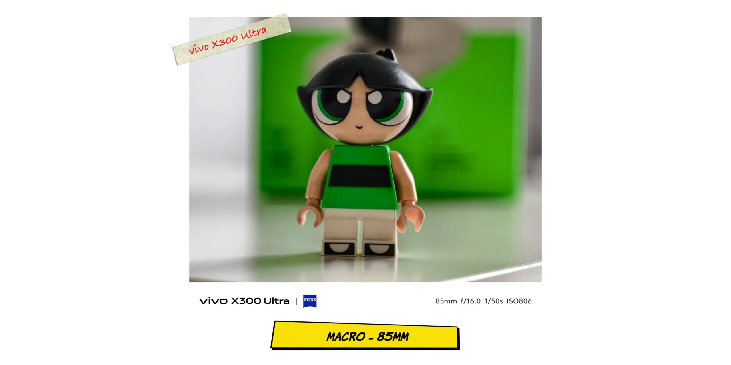 Alternative macro comparison scene at 85mm focal length showing color vibrancy.